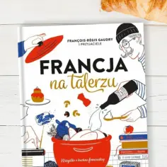 Okładka książki "Francja na talerzu" pokazuje, z czego słynie Francja: wino, sery, ciasta i wykwintne potrawy.